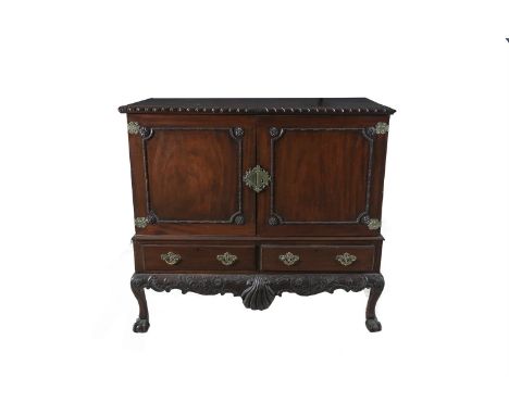 A GEORGIAN STYLE MAHOGANY BLANKET CHEST, with gadroon rim, twin panel fielded doors above a twin drawer base, with brass 'tir