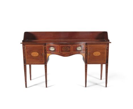 A 19TH CENTURY INLAID MAHOGANY BOWFRONT SIDEBOARD, in the Sheraton taste, with raised panel back and sides, above a single fr