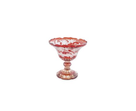 A BOHEMIAN RUBY-STAINED SWEET MEATS PEDESTAL BOWL, of circular form, with wavy rim, the body with a running deer in a continu