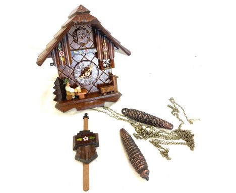 German Cuckoo clock with weights and pendulum 