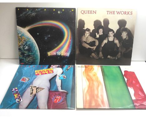 4 vintage lps includes steely dan rolling stones rainbow and Queen 
