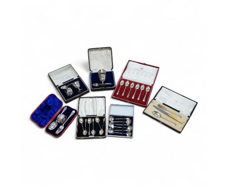 Three assorted silver christening sets including spoon, fork and napkin ring by William Hutton &amp; Sons, London, 1896, one 