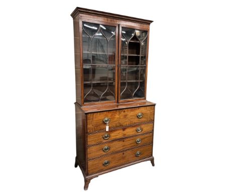 A George III mahogany secretaire bookcase, width 116cm, depth 57cm, height 234cm, one glass pane missing