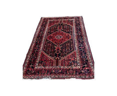 A Belouch rug, a Bokhara mat and a Caucasian style rug, largest 230 x 147cm
