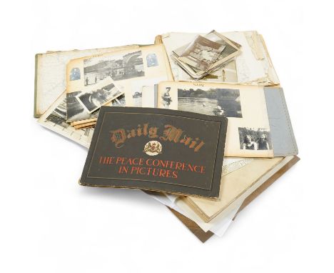 An archive of post First World War documents and photographs including two part letters signed by Winston Churchill, both of 
