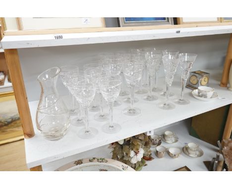 Various part suites of Jasper Conran hand cut Stuart Crystal ‘Aura’ glasses. Including eight Champagne, five large wine and s