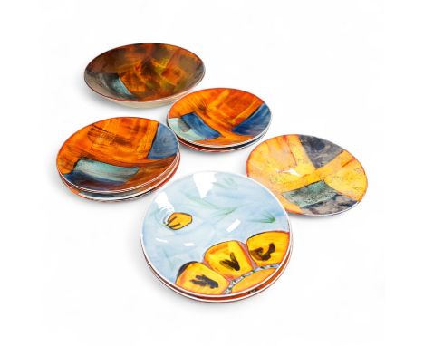 A Poole pottery ‘Gemstones’ fruit bowl and set of five smaller matching dishes, a similar patterned dish and two ‘Wild Poppy’