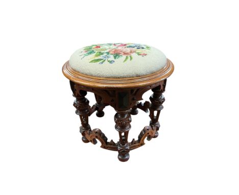 A Victorian circular mahogany stool with drop-in tapestry seat, diameter 48cm, height 44cm