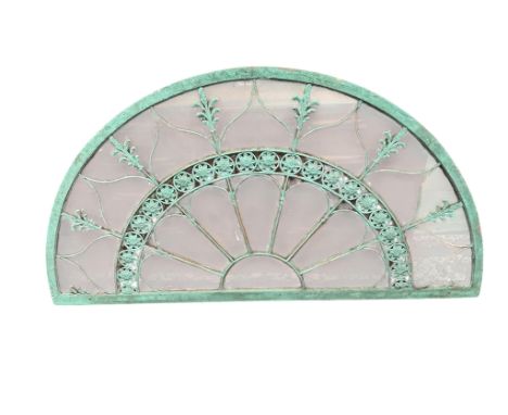 A 19th century wood and wrought iron fan light, later painted, width 170cm, height 91cm