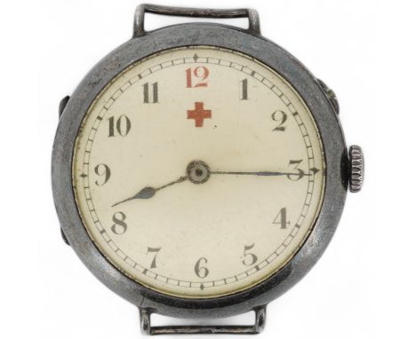 A lady's early 20th century silver nurse's or medic's manual wind wrist watch, with Red Cross symbol on the dial, engraved in