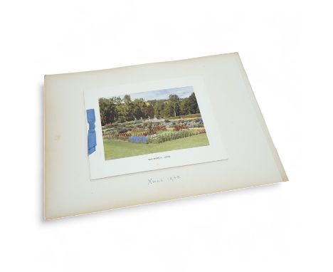 HRH King George VI and Queen Elizabeth signed Christmas card for 1938, with a colour photograph of the garden at Balmoral Cas