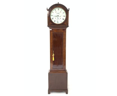 Early 19th century mahogany longcase clock, the arched hood with three turned finials over cross banded and box wood and ebon