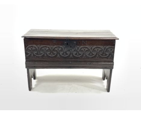 18th century and later oak Sword chest, with hinged lid, carved front, and panel end supports, W94cm - Condition Report 
