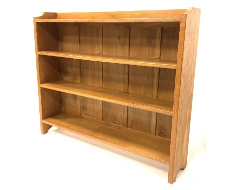 'Eagleman' oak open bookcase, with adzed and shaped panel end supports supporting three shelves, W127cm, H107cm,  D25cm - Con