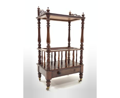 Victorian mahogany Canterbury whatnot, half galleried pierced top raised on turned supports over two division magazine rack, 