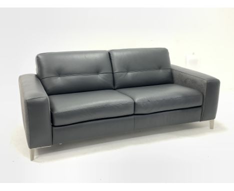 Contemporary three seat leather sofa bed upholstered in charcoal grey leather, raised on angular brushed metal supports, W200