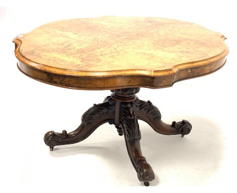 Victorian burr walnut loo table, the well figured quarter sawn veneered serpentine top raised on turned pedestal and four lea