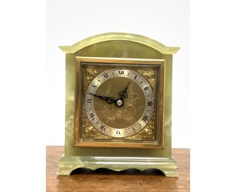 Elliot and Sons onyx cased mantel clock, Silvered dial with Roman chapter ring, retailed by J R Ogdens of London and Harrogat