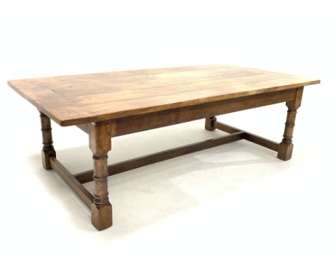 Large solid oak refectory style dining table, raised on ring turned and block supports united by 'H' stretcher, 244cm x 120cm