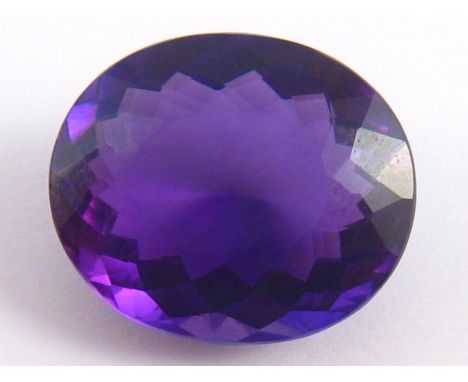 A loose polished amethyst, approx 19.4 x 16.5mm, 3.5 gms (approx 17.5 carats). VAT will be added to the hammer on this lot.
