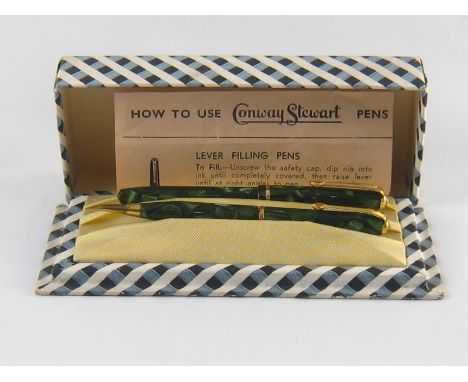A lady's Conway Stewart 25 pen and Dinkie 560 pencil set in original case with instruction leaflet.