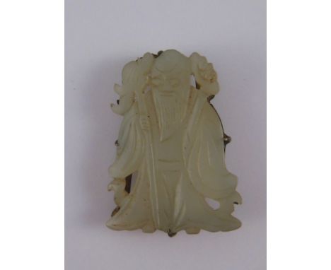 A Chinese carved jade and silver scarf clip, marked China Silver, approx 37 x27mm.