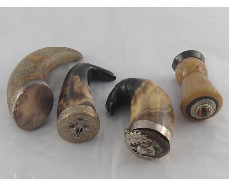 Four Scottish horn snuff mulls, one carved as the head of an animal with fangs, one with box hinged lid, one carved as a boot