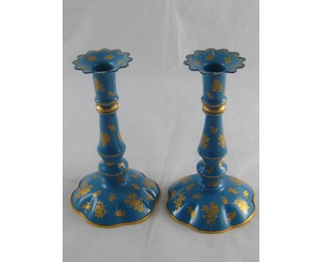 A pair of Halcyon Days blue enamel toleware candlesticks in their original boxes. 