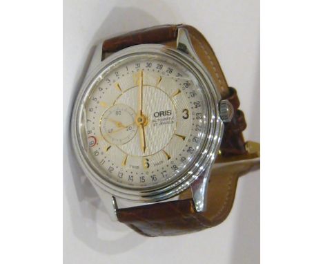 A gent's Oris automatic watch in steel case with subsidiary seconds dial and sweep date hand. Glass (AF).