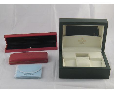 Three boxes, for Rolex, Rotary and Bueche Girod watches, together with five Tiffany pouches. 