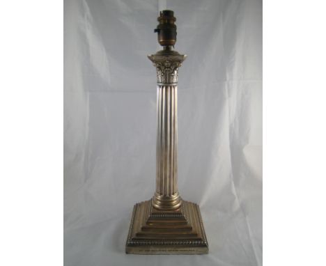 Militaria. A large silver corinthian column table lamp, an Indian military inscription" from the Officers, 32nd Sikh Pioneers