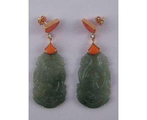 A pair of yellow metal (tests 14 carat gold) carved jade, coral and diamond earrings, jades approx 4cm, overall drop approx 6