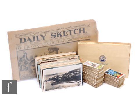 A collection of Edwardian and later postcards, some real photographs, views, also cigarette cards and a 1918 copy of the Dail