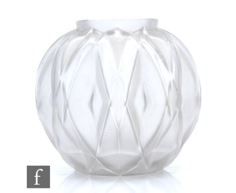 A 1930s Art Deco Andre Hunebelle Prism glass vase designed by Roger Cogneville, of ovoid form, the body relief moulded with g