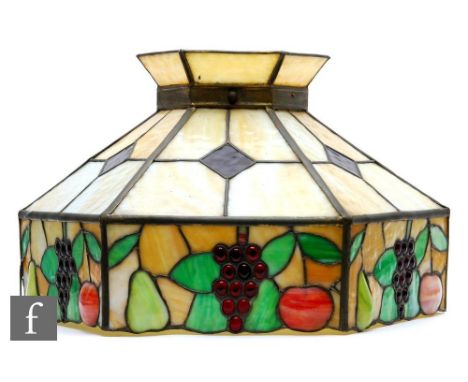 A large Tiffany style leaded and coloured panelled ceiling light shade, decorated with a border of grapes, pears and apples, 