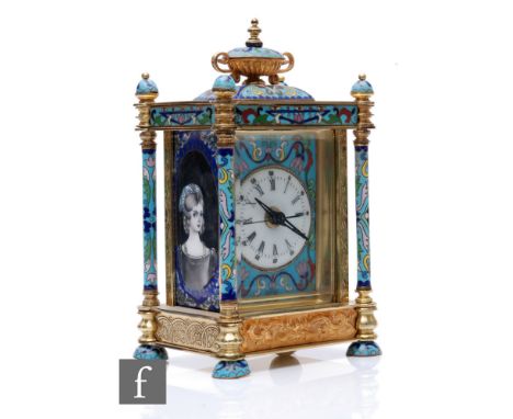 A late 20th Century French style champ leve enamel carriage clock, surmounted with an urn and oval panels of ladies to one si