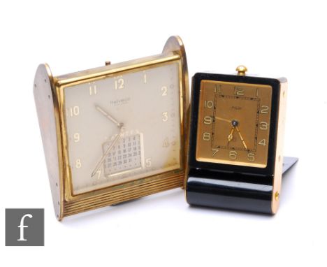 A Helveco brass calendar table or bedside clock, width 9cm, and a Jaegar bedside alarm clock. (2) 