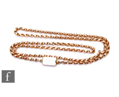 An early 20th Century 9ct rose gold faceted belcher link chain, weight 9g, length 53cm, terminating in tongue and box fastene