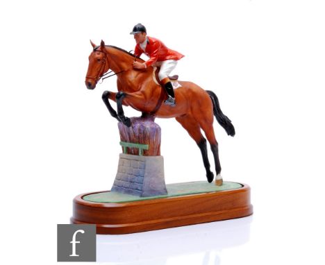 A Royal Worcester equestrian model of Foxhunter and Lt. Col. H.M. Llewellyn CBE modelled by Doris Lindner, retains original p