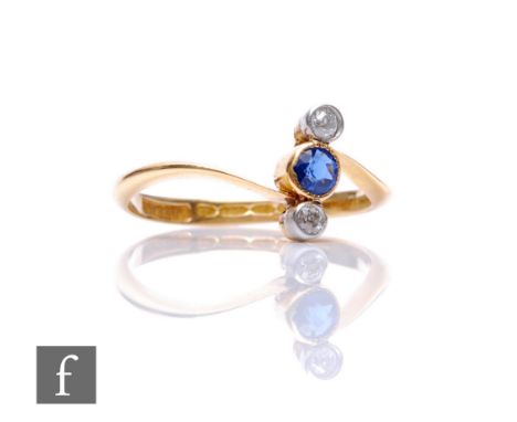 An early 20th Century 18ct hallmarked sapphire and diamond three stone ring, central sapphire flanked by diamond all stones c