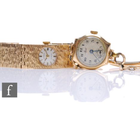 A 9ct hallmarked lady's Shield, manual wrist watch batons to a circular dial and integral 9ct brick bracelet, total weight 36