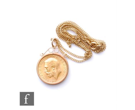 A George V full sovereign dated 1927, loose to a 9ct pendant mount and suspended from a 9ct fine curb chain, total weight 13.