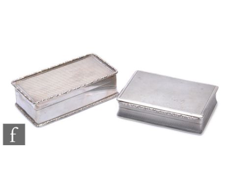 A hallmarked silver rectangular snuff box with engine turned decoration to whole, floral raised thumb piece, weight 126.5g, l