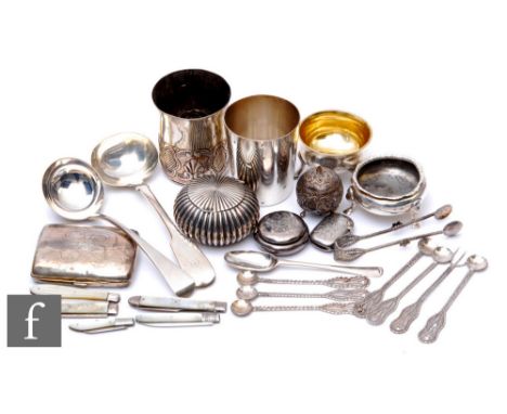 A parcel lot of hallmarked silver and white metal items to include flatware, vesta and cigarette cases, two beakers, folding 
