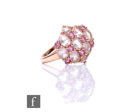 A 9ct hallmarked rose gold morganite and kunzite cluster ring, seventeen claw set stones to an oval head, weight 3g, ring siz