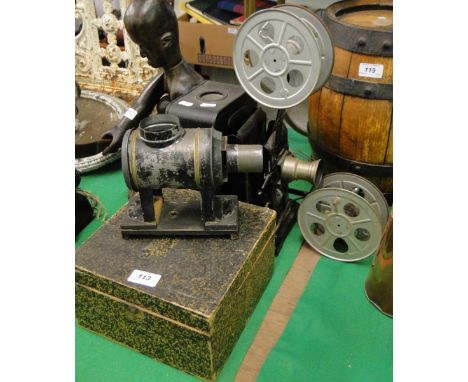 A vintage tin projector, a box, slides etc