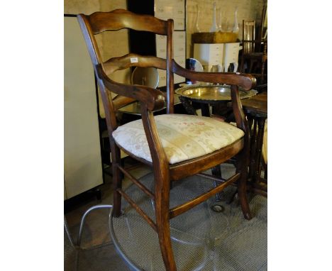 A French walnut ladder back elbow chair 