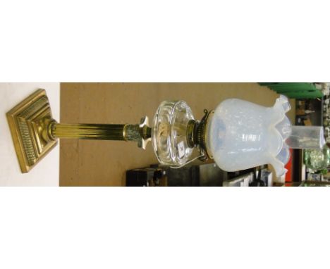 A Victorian brass Corinthian column oil lamp,with facet-cut glass font and opalescent glass frilled shade, height to top of s