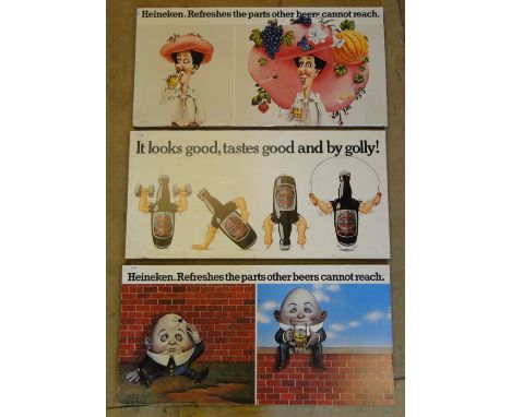 2 vintage Heineken prints on hardboard, pine mounts, & a similar Mackeson advertising print (3)