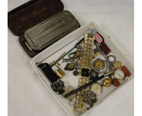 Rolls razor, watches, compass etc